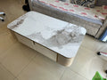 Table basse 120 x 60 cm en panneau de bois blanc et gris avec rangement contemporain